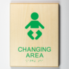 ADA compliant wooden sign showing baby diaper changing area